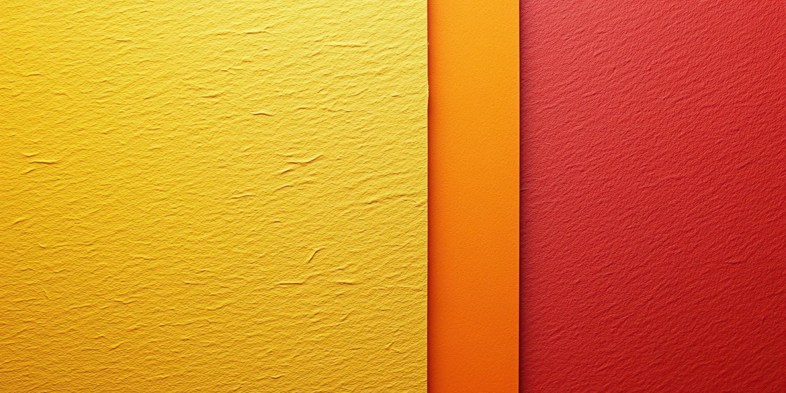 Colorful textured wall with shades of yellow, orange, and red creating a vibrant composition for artistic backgrounds